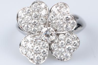 “Cosmos” ring by Van Cleef & Arpels in 18-carat white gold, adorned with 53 diamonds